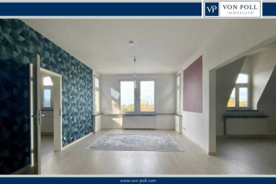 Modernisierte Wohnung mit Einbauküche und Stellplatz in zentraler Lage