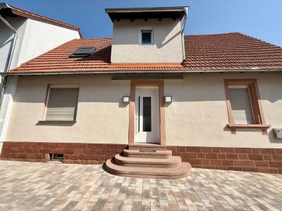 Erstbezug nach Sanierung: EG-Wohnung mit Terrasse & moderner Küche in Herxheim