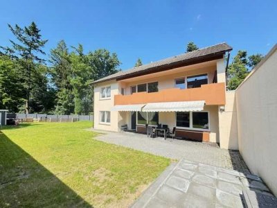 Vermieten und selbst bewohnen: Zwei Wohneinheiten mit großem Garten, Vollkeller und Garage
