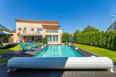 HEGERICH: Grosszügige Villa mit Garten und Pool für die gesamte Familie