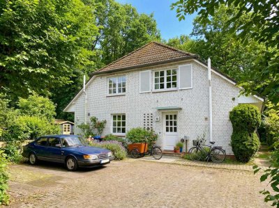 Familienglück mit direktem Zugang zum Naturschutzgebiet – Gepflegte Doppelhaushälfte mit Süd-West...