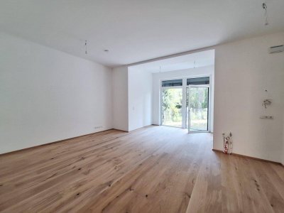 Gartenidylle trifft Komfort: Exklusive 3-Zimmer-Wohnung