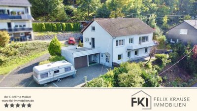 **Schönes Einfamilienhaus mit ELW und Doppelgarage in toller Lage von Siegen / Gosenbach**