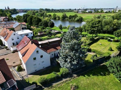 Idyllische Mainlage: Doppelhaushälfte mit Erholungsgrundstück in erster Reihe