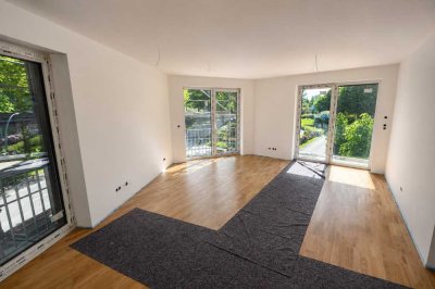 Helle Neubauwohnung im 1. Obergeschoss mit Balkon