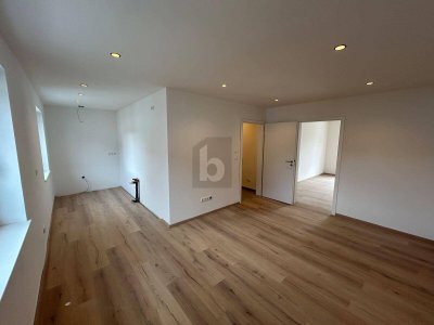 MODERNER ERSTBEZUG MIT GARTENANTEIL UND EIGENER GARAGE