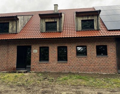 Erstbezug: 90 m² Wohnung mit Kamin & Smart Home im Grünen