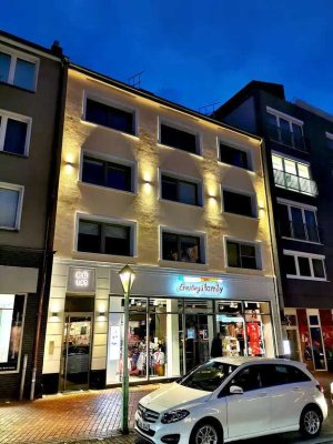 Wohnen mitten auf der Rü! - Moderne Dachgeschosswohnung mit Balkon