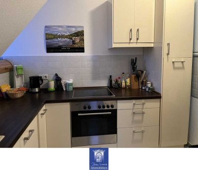 Traumhafte Dachgeschosswohnung in stilvoller Stadtvilla