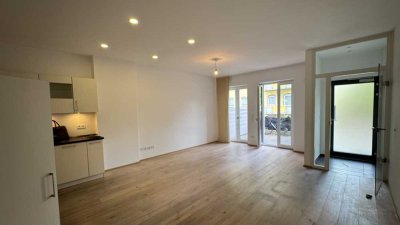 Moderne citynahe EG-Wohnung mit 2 Terrassen, EBK, TG-Platz und separatem Eingang, max.  2 Personen