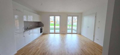 Hochwertiger Neubau mit Parkett, moderner Einbauküche und Terrasse!