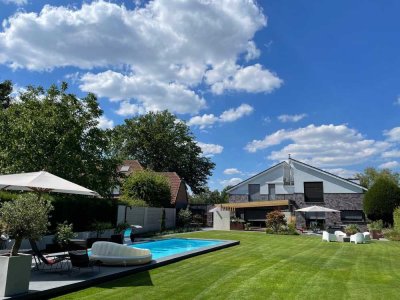 Exklusives Wohnen in Telgte: Luxuriöse Villa mit innovativer Technik und Pool