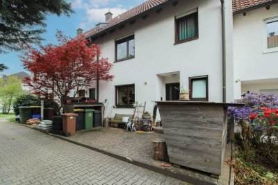 In wunderschöner, familienfreundlicher Wohnlage - Reihenmittelhaus mit kleinem Garten und Garage