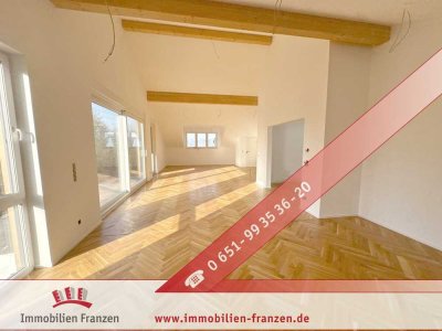 Stadtnah und doch im Grünen: hochwertige, energieeffiziente Penthousewohnung