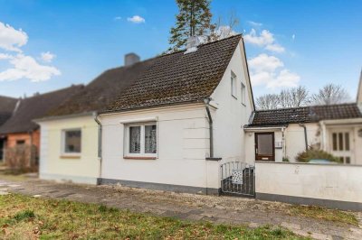Ansprechende Doppelhaushälfte mit neuem Anbau und pflegeleicht gestalteter Fläche