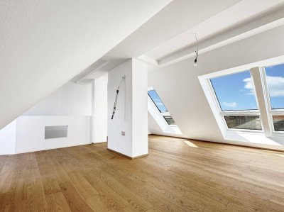 Erstbezug 3-Zimmer Dachgeschosswohnung mit großer Wohnküche