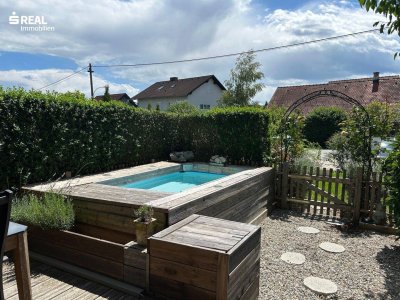 Sonnige Erdgeschosswohnung mit großem Garten &amp; Pool in ruhiger Lage