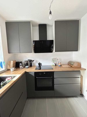 Moderne 3-Zimmer-Wohnung mit Terrasse, Garten & 2 TG-Stellplätze