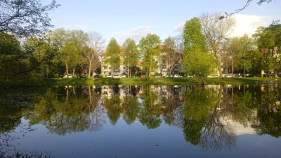 Charmante, helle 3-Zimmer-Wohnung mit Parkblick, Balkon und Tiefgaragenstellplatz!