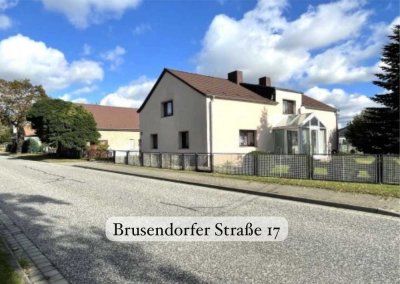 Einfamilienhaus mit Einliegerwohnung, Hof, Garage und Garten in Brusendorf