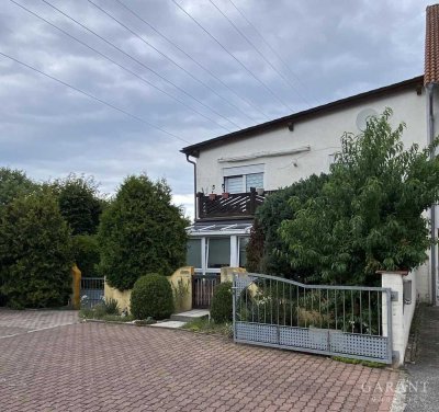 Einfamilienhaus inklusive ehemaliger Gewerbeeinheit mit vielseitigen Nutzungsmöglichkeiten