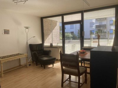 Geschmackvolle 2-Raum-Wohnung mit gehobener Innenausstattung mit Balkon und EBK in Düsseldorf
