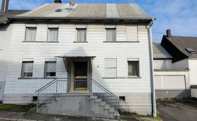 Einfamilienhaus mit gewerblichem Anbau