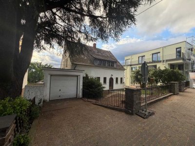 Großzügiges Wohnen für die ganze Familie mit Garten, Garage und herrlicher Aussicht