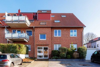 Gepflegte 3 Zimmerwohnung mit Dachterrasse, Einbauküche und Tiefgaragenstellplatz