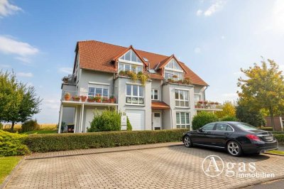 Investieren mit Aussicht – Vermietete 4-Zimmer Maisonettewohnung mit Garage