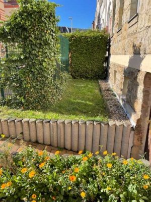 Stilvoll saniertes Mehrfamilienhaus mit Vorgarten in Zentrumslage