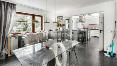 Traumhaftes Mehrfamilienhaus mit großzügigem Garten, luxuriösem Badezimmer und Wintergarten