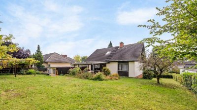 Charmantes Einfamilienhaus mit großem Garten in TOP-Wohnlage