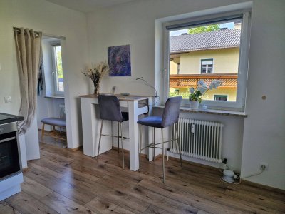 Modern eingerichtete Studiowohnung mit Gemeinschaftsgarten - zentral gelegen