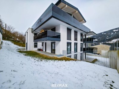Nur 15 Minuten von Innsbruck: Neubauwohnung mit ca. 81 m² großem Garten und Terrasse