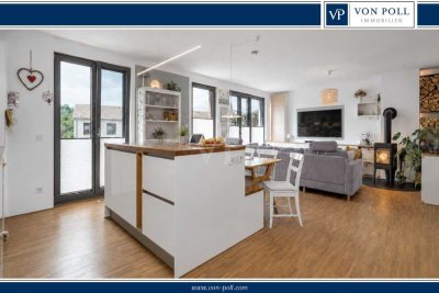 Moderne Etagenwohnung mit Kamin und grünem Weitblick