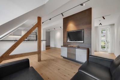 Exklusivität & alpiner Charme: Stadtwohnung mit Interieur der Kitzbüheler Werkstätten