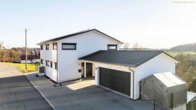 Modernes Einfamilienhaus mit Einliegerwohnung, Doppelgarage und Carport in Scheer