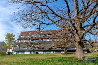 Außengewöhliche Immobilie im ehemaligen Camp King: Elegante 3 Zimmer Wohnung mit großer Terrasse