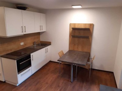 Geschmackvolle, neuwertige 1-Zimmer-Erdgeschosswohnung mit geh. Innenausstattung mit EBK