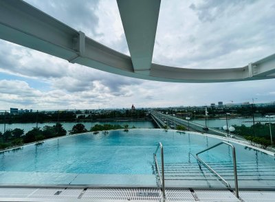 PROVISIONSFREI! DANUBEFLATS! ERSTBEZUG! DIREKT AM WASSER! &amp; DER U1 ! GYM! POOL! FUßBODENKÜHLUNG! EINBAUKÜCHE! WEITBLICK.