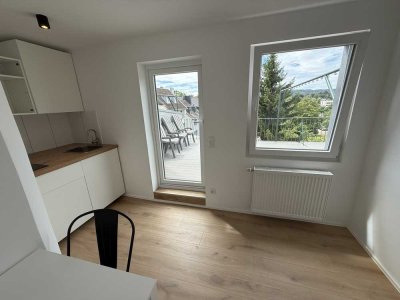 Möbelierte 2 Zimmer Wohnung mit großer Süd-Terrasse – Erstbezug