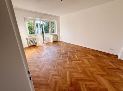 Stilvolle Altbauwohnung mit Fischgrätparkett, neuem Bad & parkähnlichem Garten im Bismarckviertel