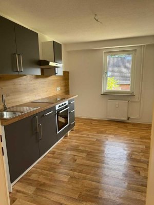 2 Zimmerwohnung mit Einbauküche und Garten