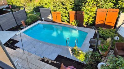 Exclusive Villa mit ELW, Doppel-Garage, Balkone, Terrassen, Erdwärme, Photovoltaik, Pool uvm.