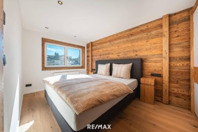 Sanierte Perle mit alpinem Flair: Exklusive 2-Zimmer-Wohnung