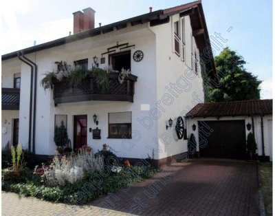 Charmante Doppelhaushälfte mit Garage & Garten – Ihr neues Zuhause wartet!