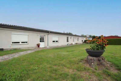 Attraktives Kapitalanlageobjekt: Mehrfamilienhaus mit Gewerbeeinheit und solider Rendite