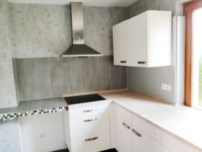 Freundliche sanierte 3-Zimmer-Wohnung mit EBK in Buende