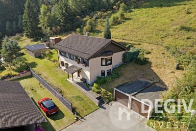 Kapitalanlage mit Wohnrecht - Charmantes Einfamilienhaus mit Waldgrundstück, Sauna & Scheune